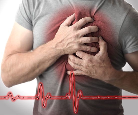 An image of a man holding his chest and suffering from chest pain illustrates Complications of Tachycardia.