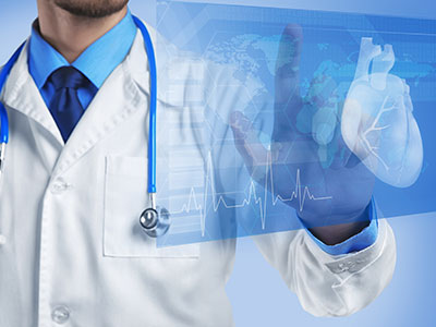 A medical expert monitors a heart rhythm on a virtual screen.