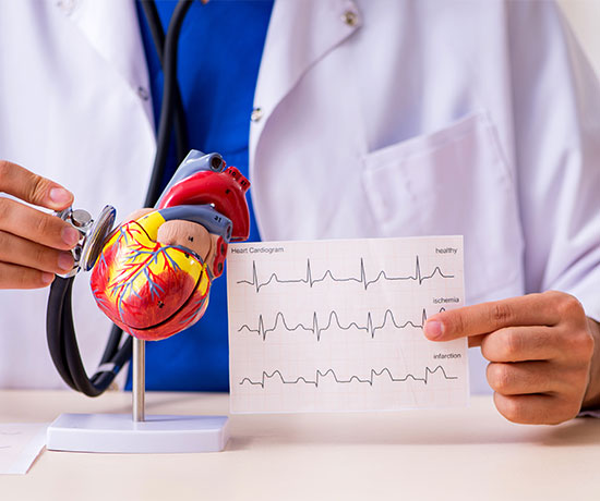 An image of a medical expert monitoring a heart model with a stethoscope and displaying a heart pulse report illustrates Tachycardia- a high pulse rate.